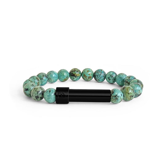 African Turquoise beaded bracelet with a sleek polished stainless steel screw-top message capsule, designed to store handwritten notes, displayed on a white background.