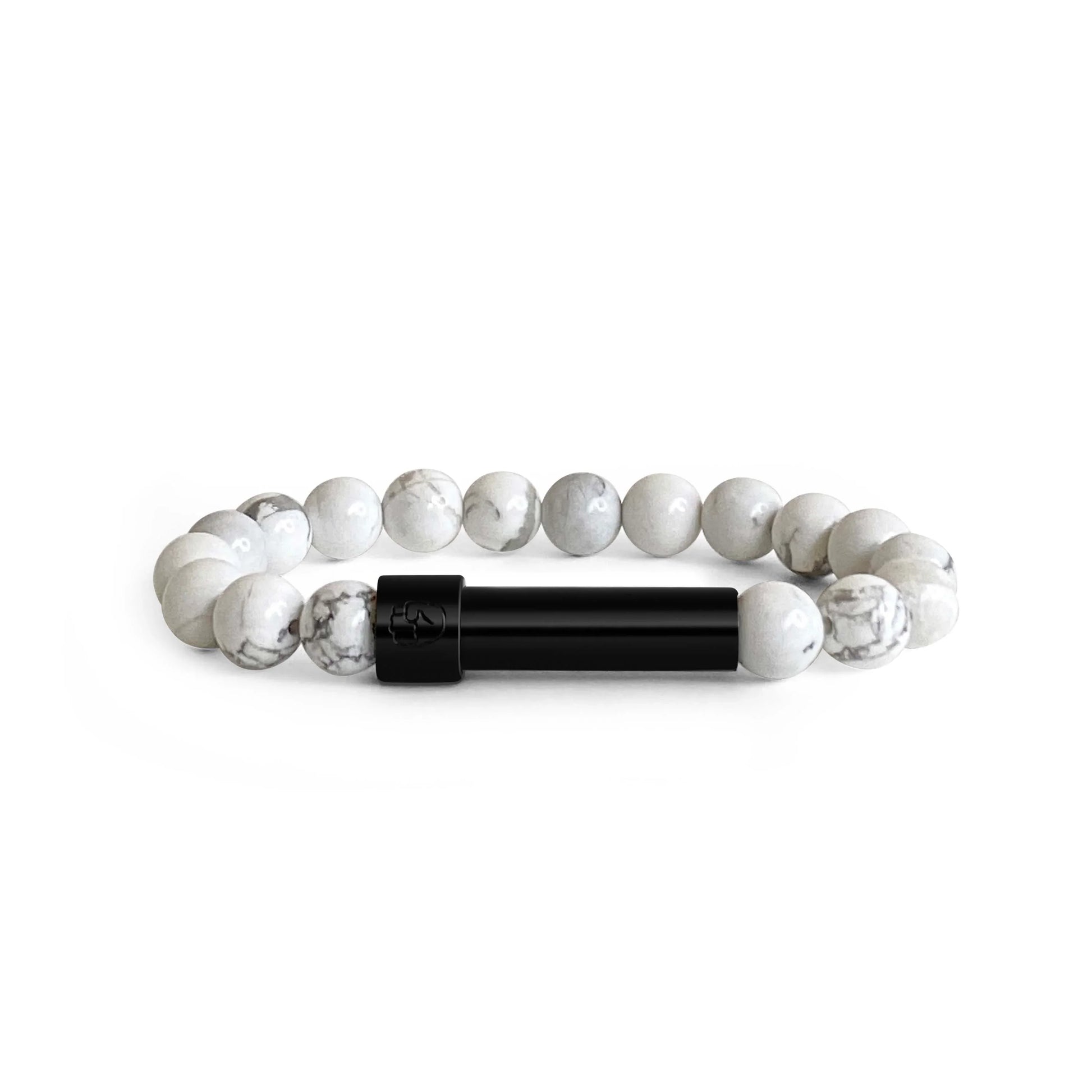 White Howlite beaded bracelet with a sleek black screw-top message capsule, designed to store handwritten notes, displayed on a white background.